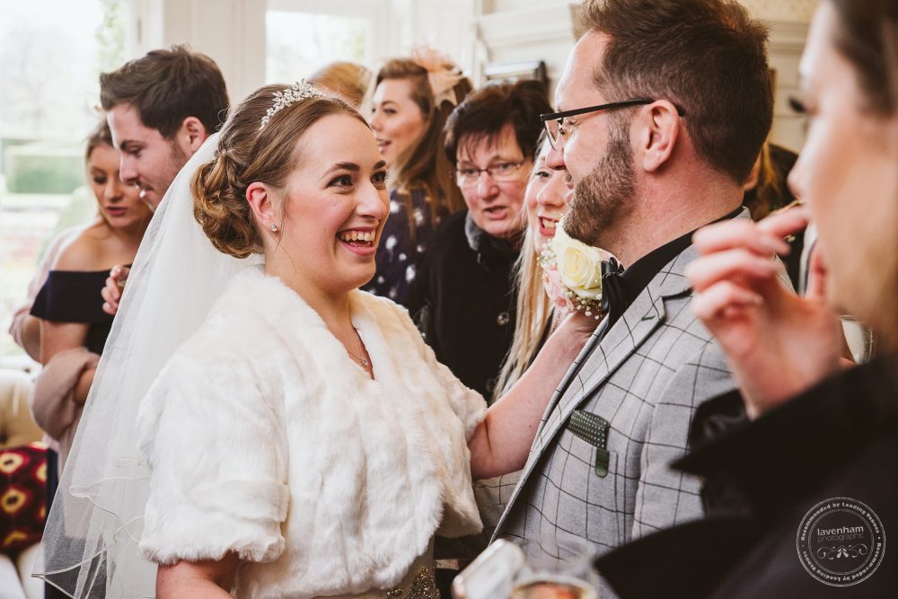 Guests mingle at Chippenham Park Wedding