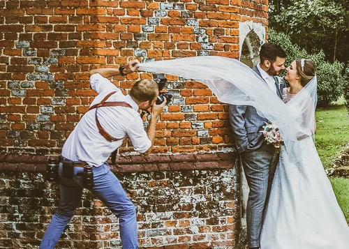Ben Brown of Lavenham Photographic, photographing a Bride and Groom on their wedding day