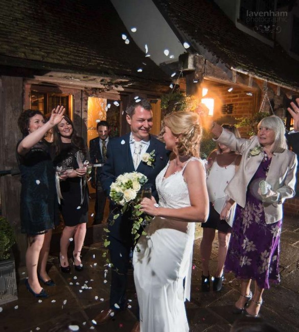Bride and groom at Swan Hotel, Lavenham, Confetti photo at night with remote lighting
